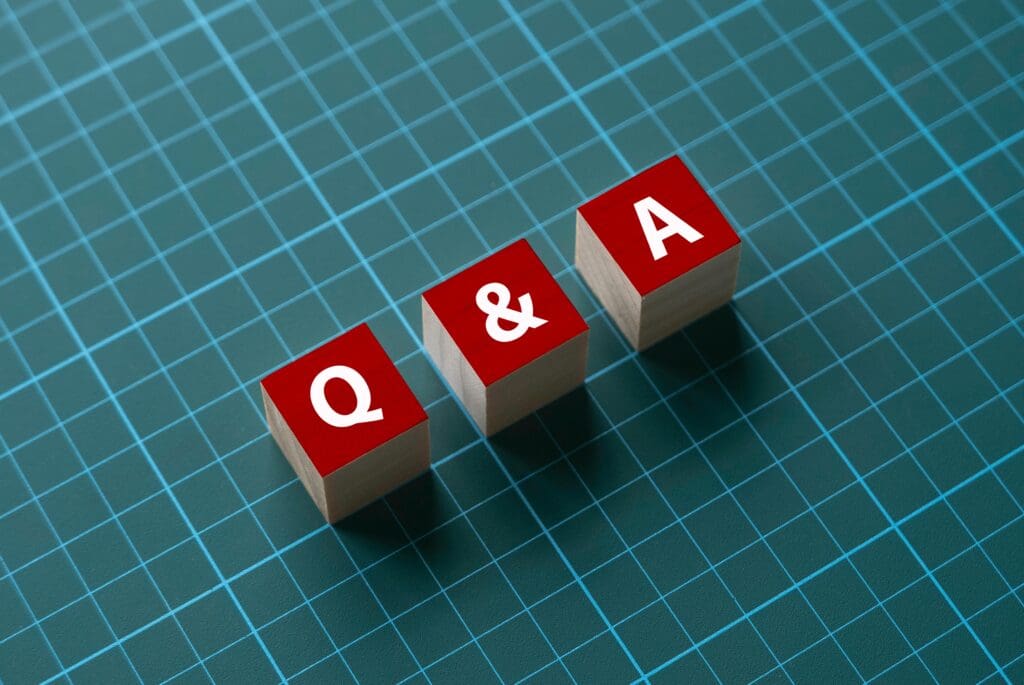 Wooden block letters Q & A.  Concept of answering questions.