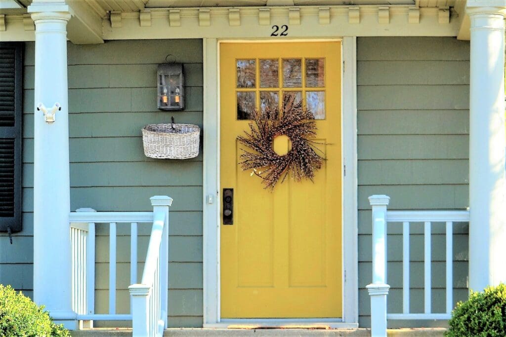 Stylish decorations on traditional front porch